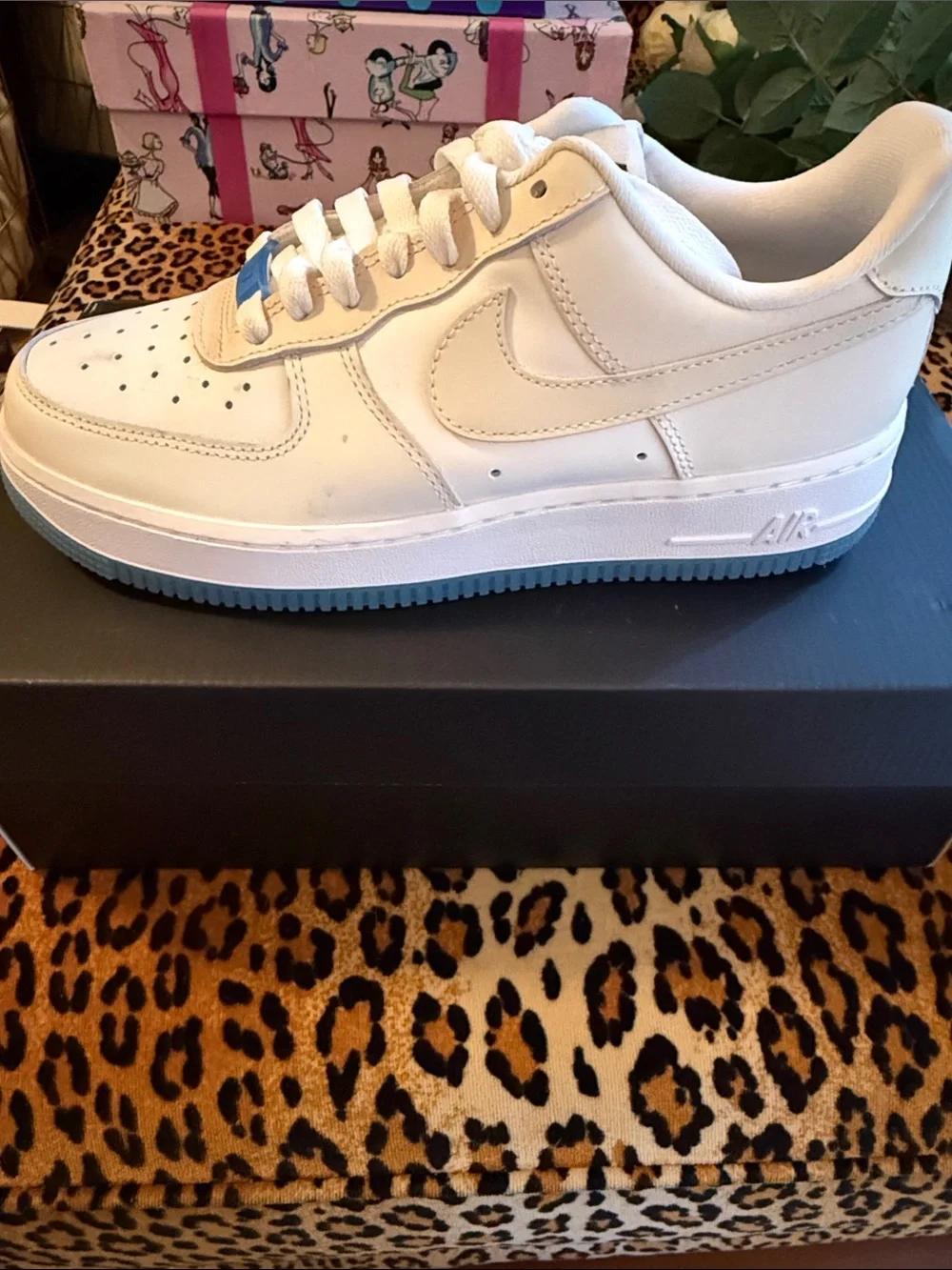 Nike Air Force 1 Low-Top Leather Sneakers in White with Light Blue Sole